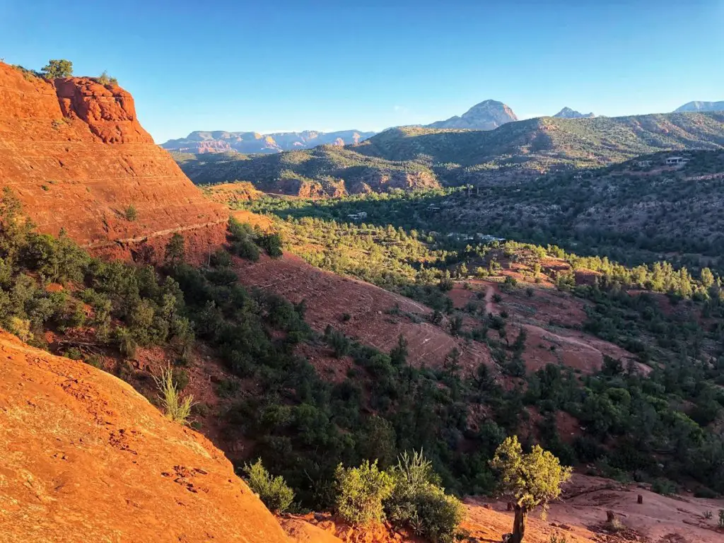 views from Bear Mountain hike - red rocks and green trees