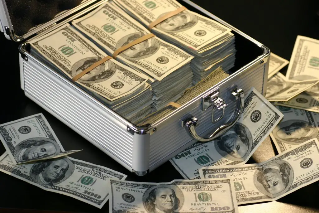 stacked up money in a case