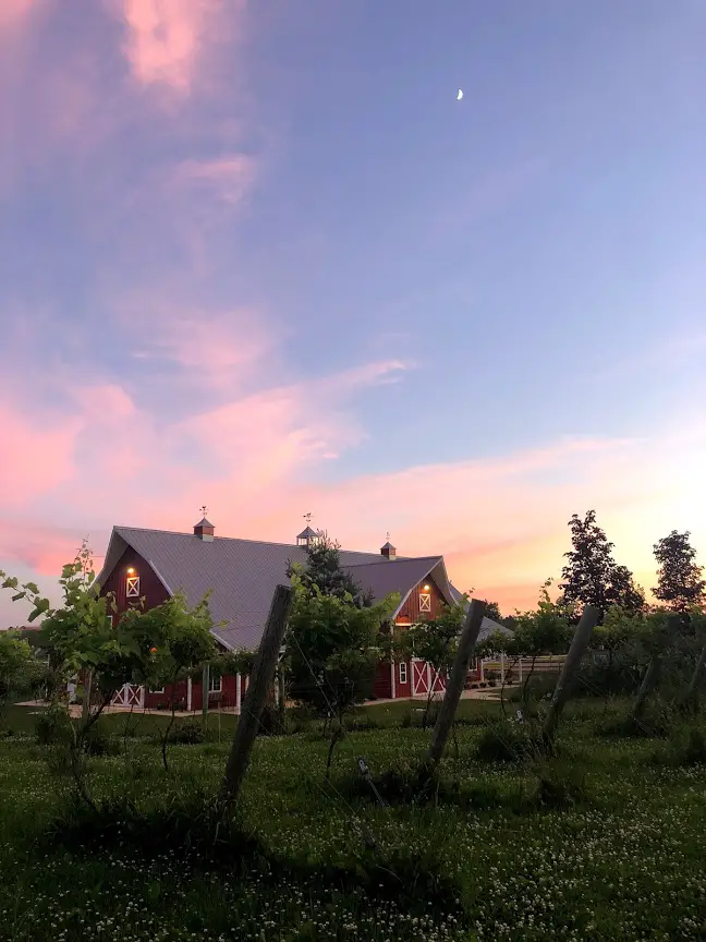 red barn farm sunset